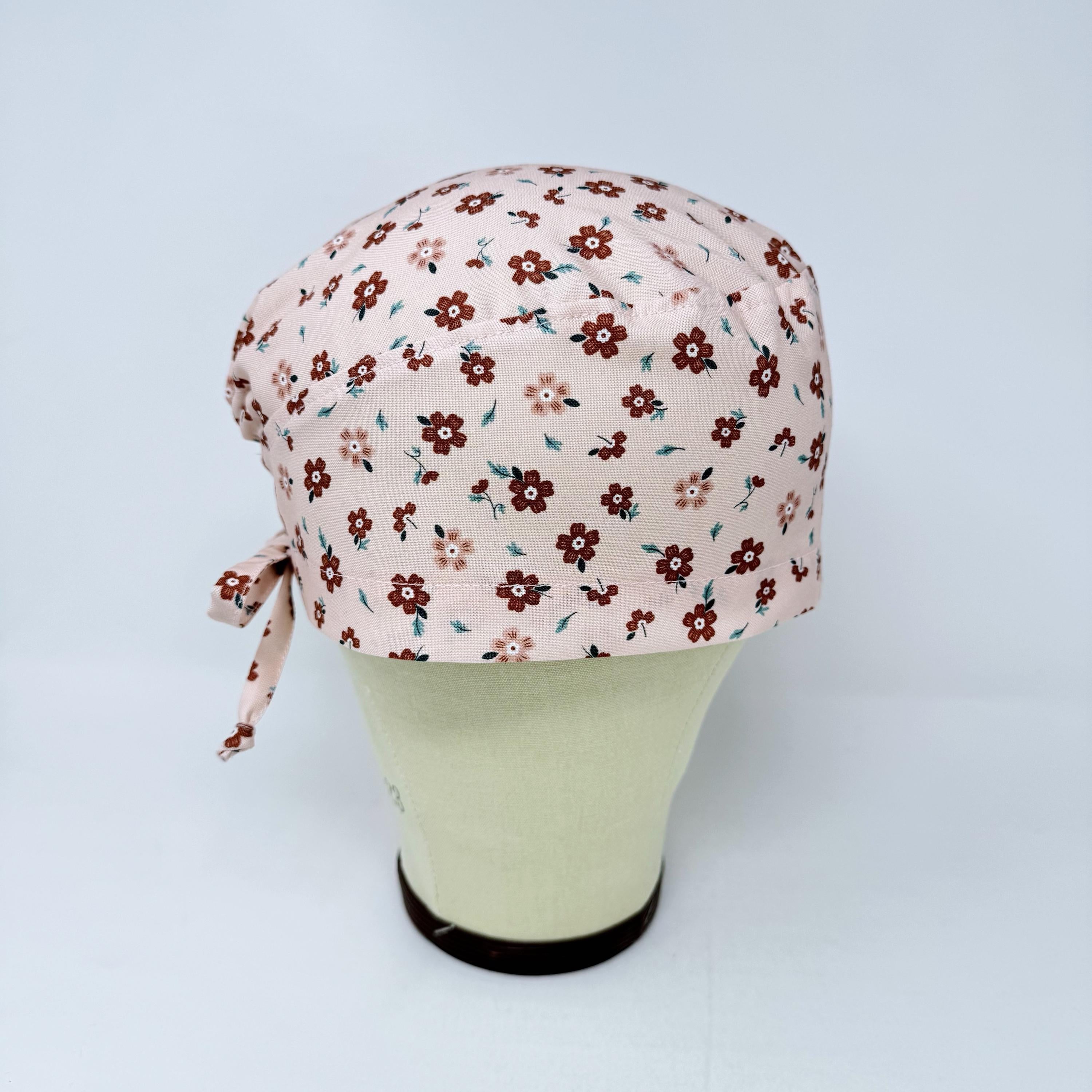 Peach Flower Skull tie-back style surgical scrub cap for men by Paradise Caps.