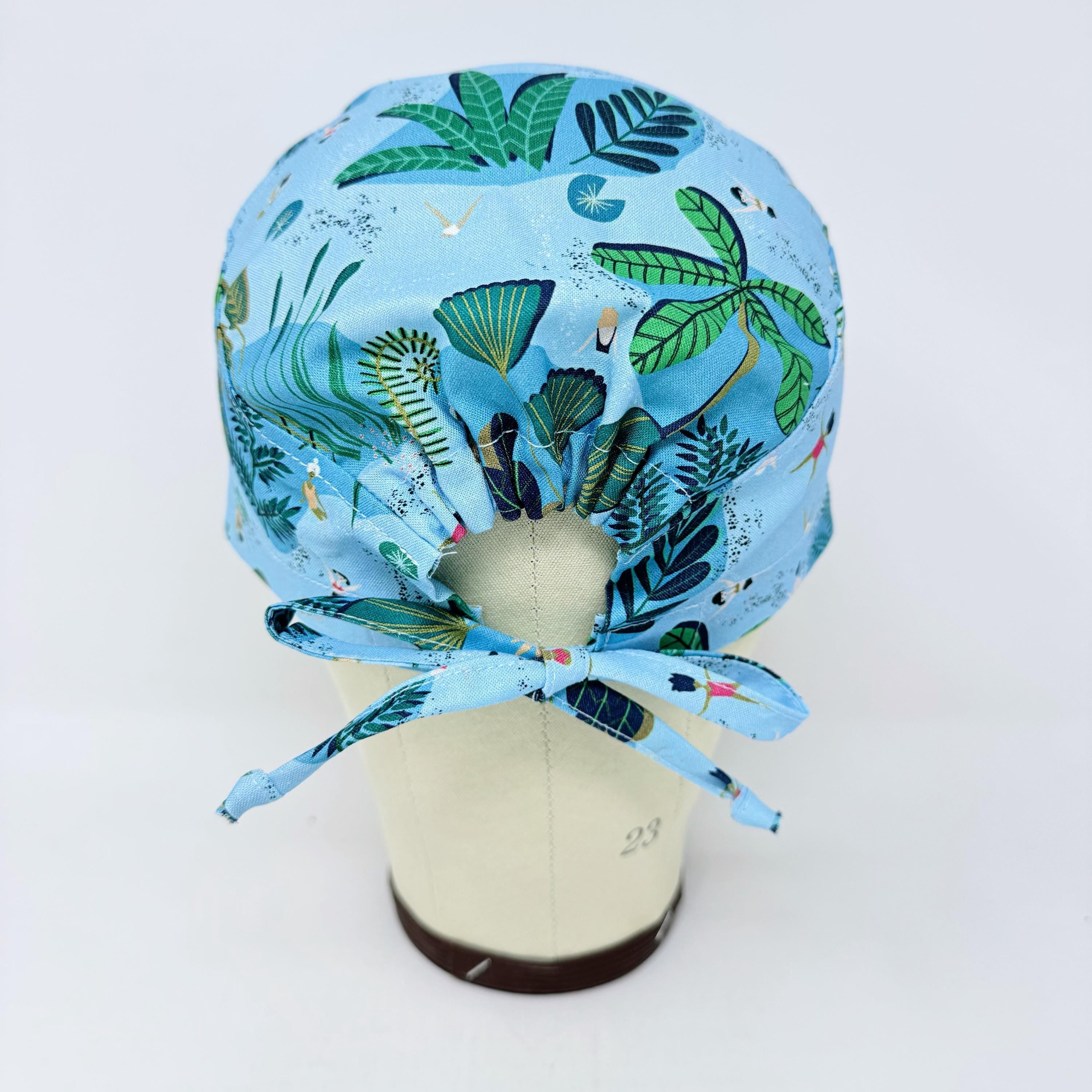 Blue Jungle Skull tie-back style surgical scrub cap for men by Paradise Caps.