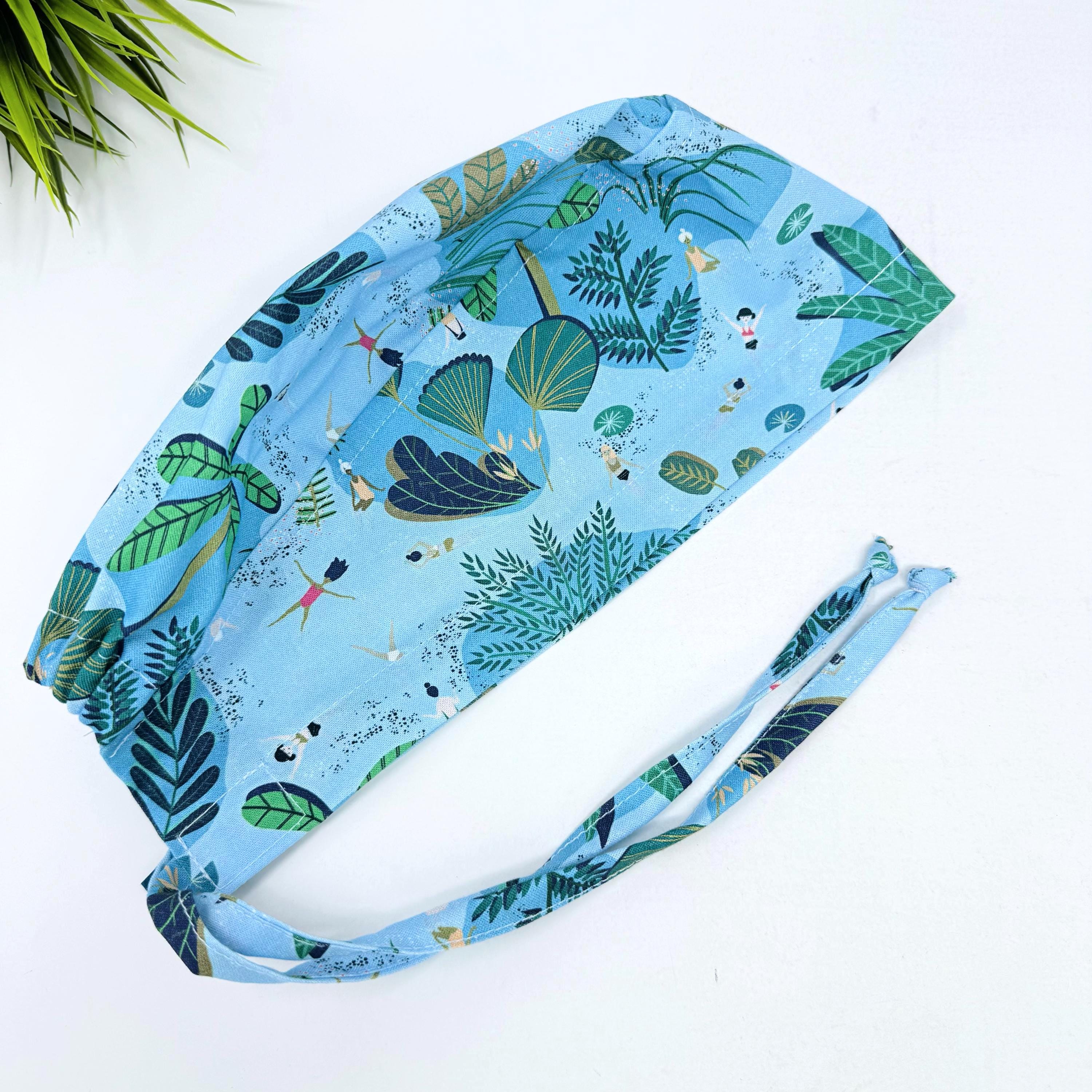 Blue Jungle Skull tie-back style surgical scrub cap for men by Paradise Caps.