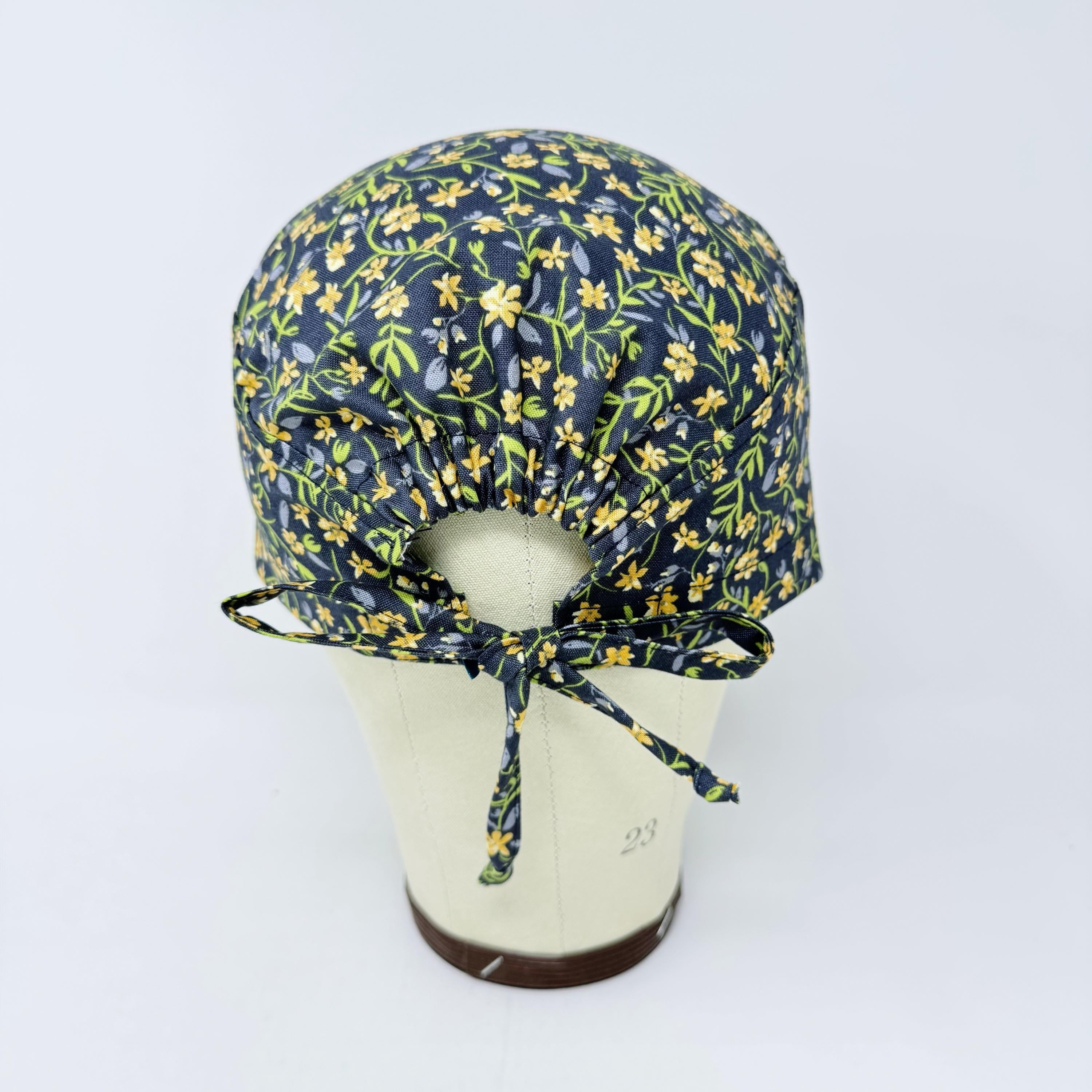 Yellow Flower Skull tie-back style surgical scrub cap for men by Paradise Caps.