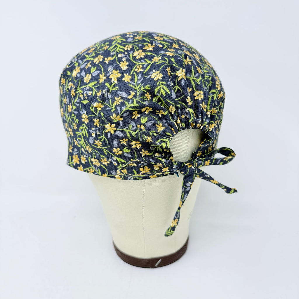 Yellow Flower Skull tie-back style surgical scrub cap for men by Paradise Caps.