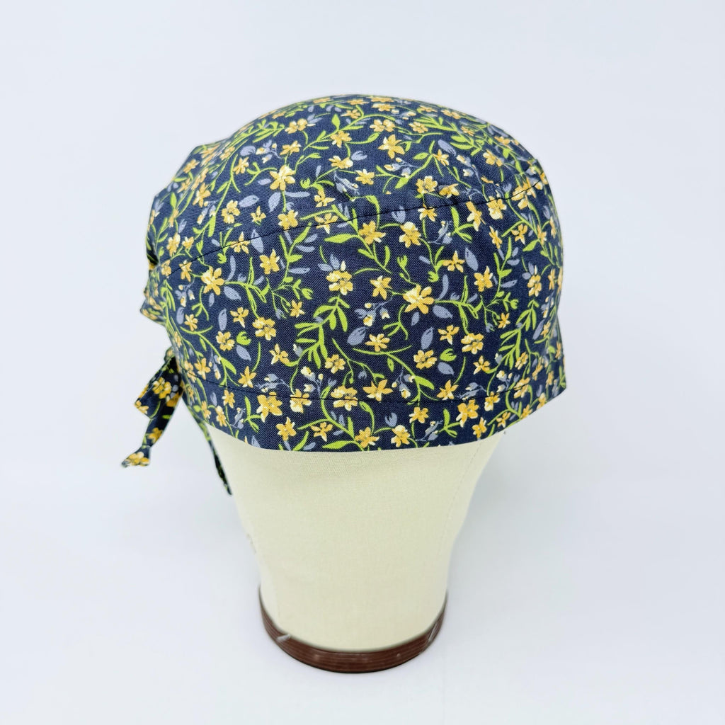 Yellow Flower Skull tie-back style surgical scrub cap for men by Paradise Caps.