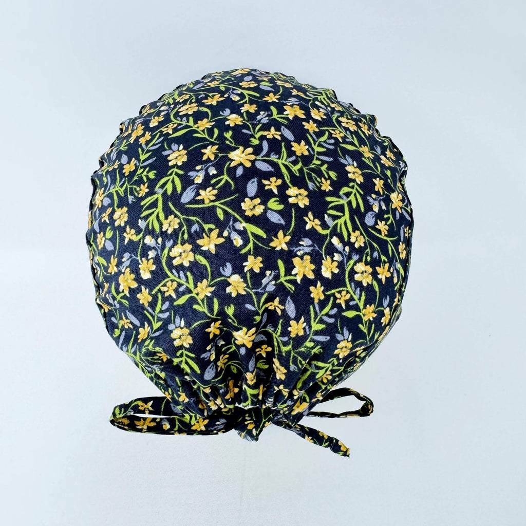 Yellow Flower Skull tie-back style surgical scrub cap for men by Paradise Caps.