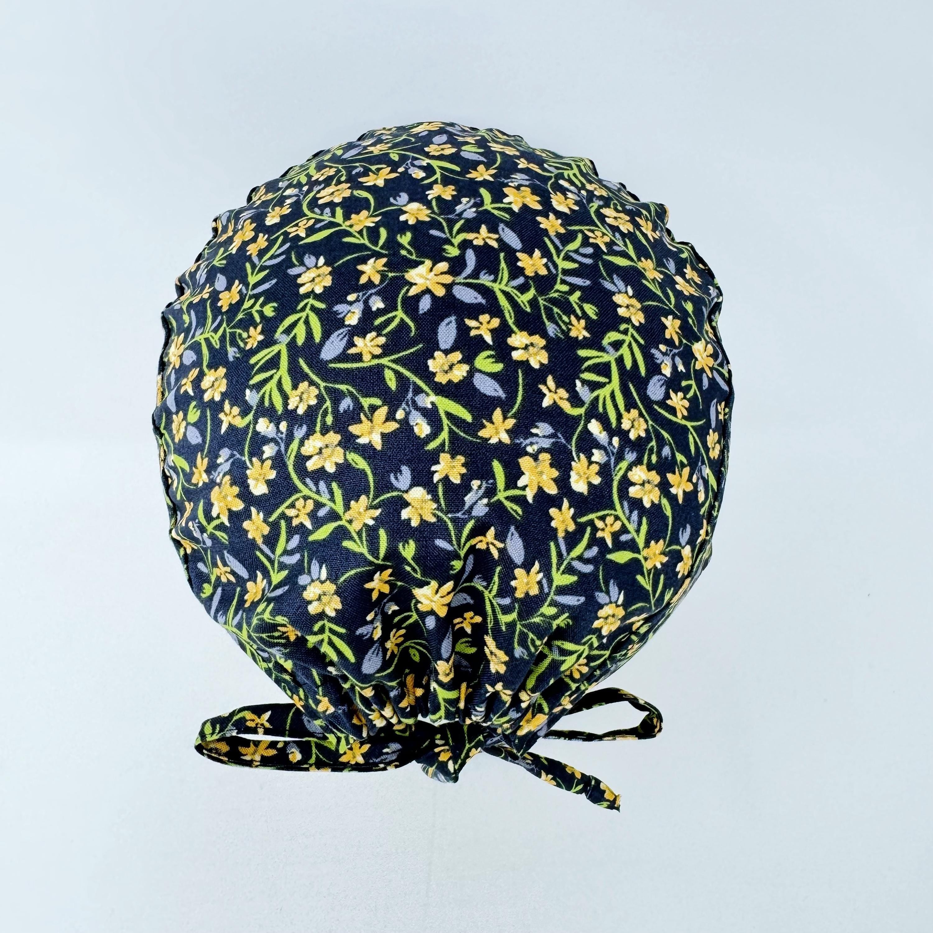 Yellow Flower Skull tie-back style surgical scrub cap for men by Paradise Caps.