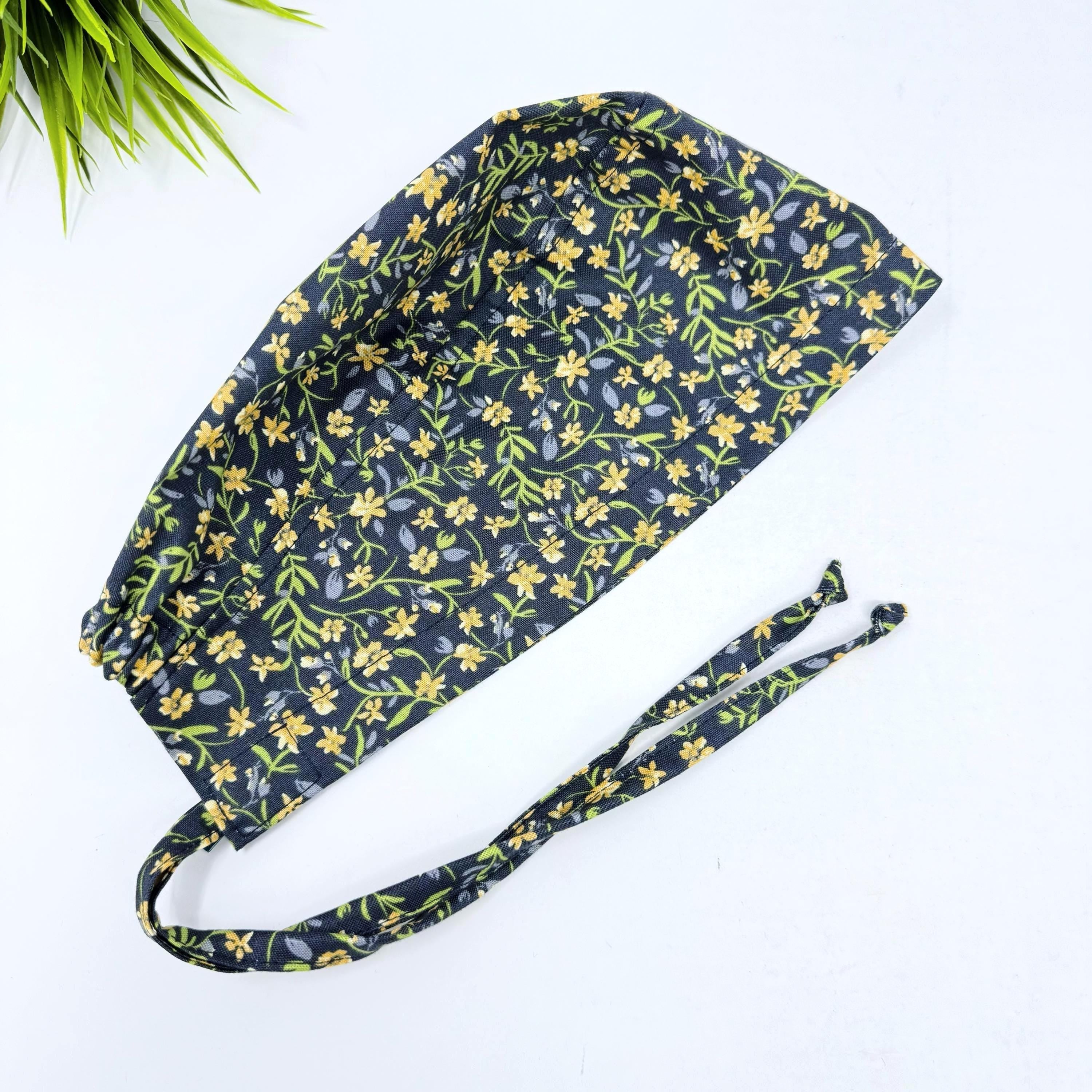 Yellow Flower Skull tie-back style surgical scrub cap for men by Paradise Caps.