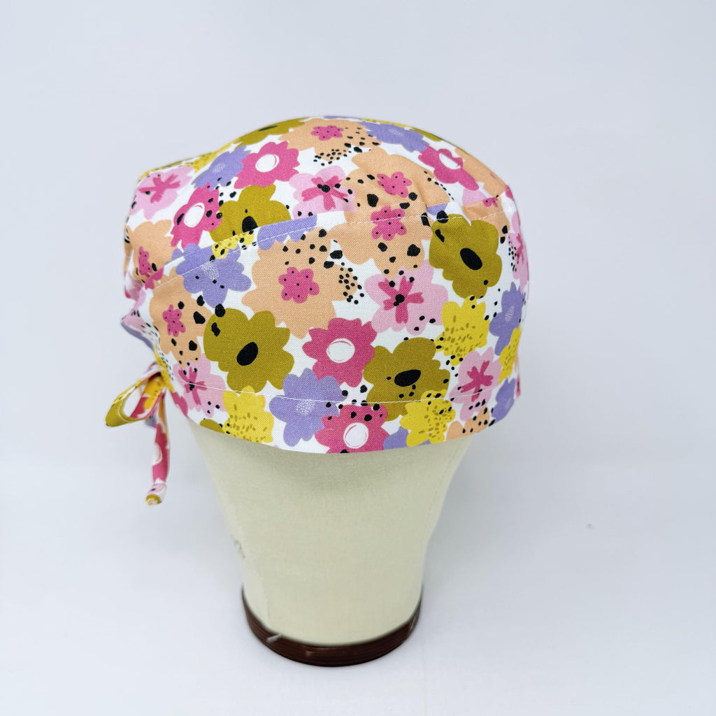 Colorful Flower Skull tie-back style surgical scrub cap for men by Paradise Caps.