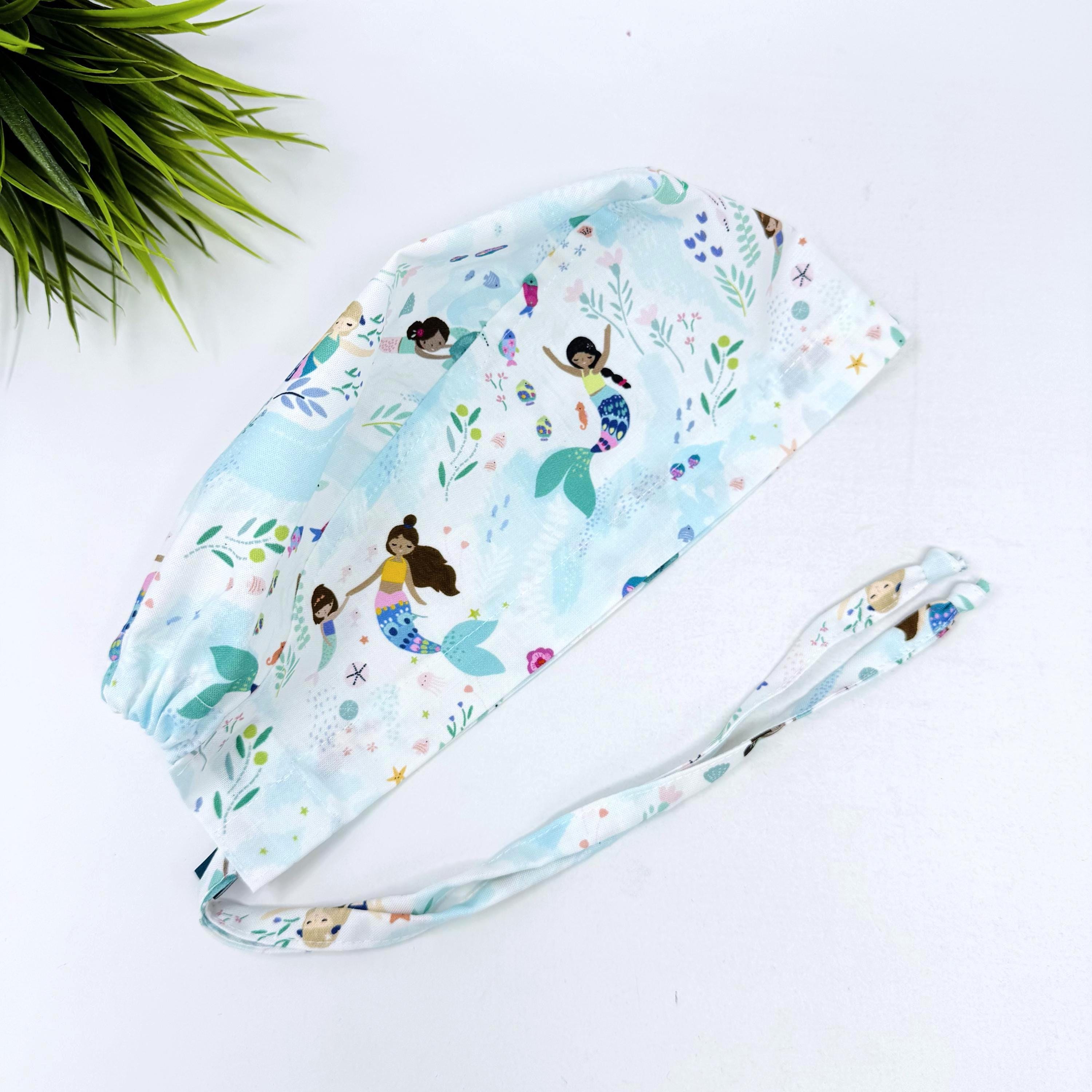 Cute Mermaid Skull tie-back style surgical scrub cap for men by Paradise Caps.